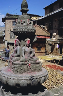Kathmandu Valley Prints: Chorten or stupa with carvings of the Buddha