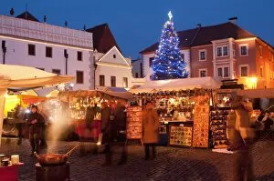 Christmas Market stalls and Christmas tree at twilight, Svornosti Square