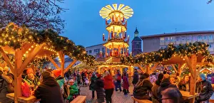Bustling Prints: Christmas Market stalls in the market square in Altstadt Spandau at dusk