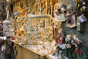 Dolls Prints: Christmas merchandise at stall of Christmas Stern Advent Markt, Salzburg, Austria, Europe