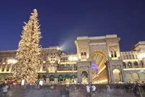 Radiant Prints: Christmas tree and Galleria Vittorio Emanuele entrance illuminated at dusk
