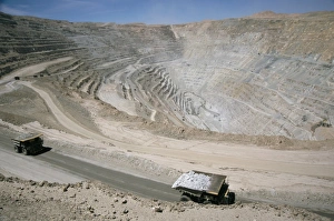 Industry Prints: Chuqui open-pit copper mine, 4km long, 720m d eep, trucks each carrying 300t of ore