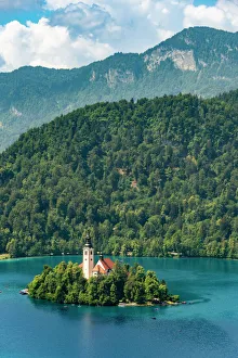Slovenia Prints: The Church of the Assumption of Mary on its own island, Lake Bled, Slovenia, Europe