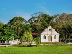 Simplicity Prints: Church building amid greenery in Uaxactun Village