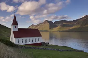 Nordoyar Prints: Church built in 1920 at Husar, Kalsoyarfjordur and Kunoy hills in the distance