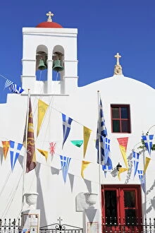 Greek Culture Gallery: Church with flags in Mykonos Town, Mykonos Island, Cyclades, Greek Islands, Greece, Europe