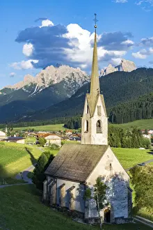 Bolzano Province Prints: Church in the green landscape of alpine village of Villabassa (Niederdorf), Val Pusteria