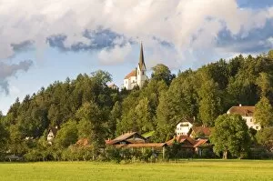 Church on hill and houses, Kamnik, Slovenia, Europe