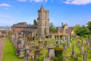Cemetery Prints: Church of the Holy Rude stands in Valley Cemetery surrounded by graves in Stirling Stirlingshire Scotland