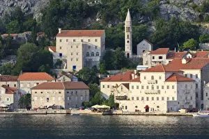 Perast Prints: Church of Our Lady of the Rosary and a waterside restaurant lit by evening light