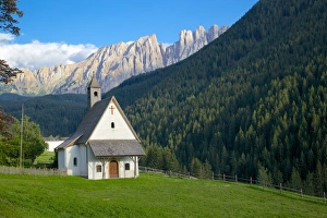 Church and Latemar Group mountains near Welschnofen, Bolzano Province, Trentino-Alto Adige / South Tyrol, Italian Dolomites, Italy, Europe