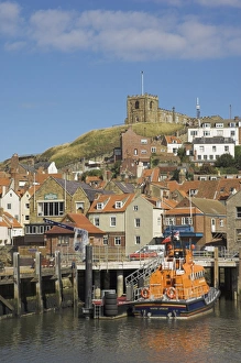 Whitby Prints: Church and lifeboat in the harbour, Whitby, North Yorkshire, Yorkshire