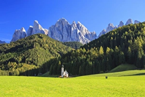 Church of Ranui surrounded by green meadows in autumn, St. Magdalena, Funes Valley