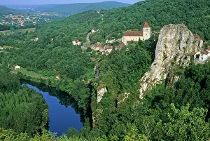 Lookout Prints: Church of Saint-Cirq-Lapopie overlooks Lot River valley in Midi-Pyrenees region of France during sunny weather