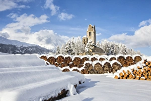 Engadine Prints: The church of San Gian surrounded by snowy woods, Celerina, Engadine, Canton of Grisons