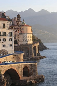 Atrani Prints: Church of Santa Maria Maddalena and coast road with mountains, warm early morning light