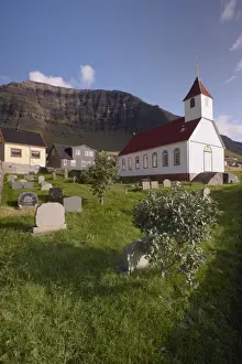 Tomb Stones Prints: Church and village of Kunoy, located on the west coast of the island Kunoy