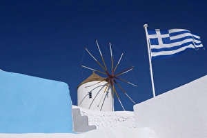 Greek Flag Prints: Church, windmill and Greek flag, Santorini, Cyclades, Greek Islands, Greece, Europe