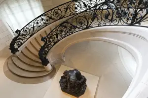 Metalwork Prints: Circular staircase with the statue Ugolino and His Son by Jean-Baptiste Carpeaux