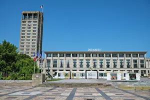 Pedestrians Prints: City hall building in Le Havre with flags and architecture under clear sky