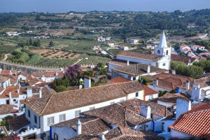 Traditionally Portuguese Prints: City overview with Igreja de Santa Maria in the background, Obidos, Portugal, Europe