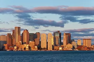 Images Dated 8th October 2009: City skline viewed across Boston harbour at dawn, Boston, Massachusetts