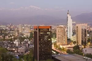 City skyline and the Andes mountains at dusk, Santiago, Chile, South America