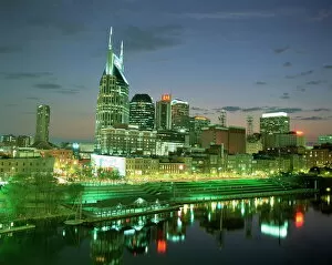 City skyline and Cumberland river at dusk