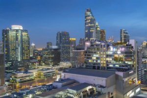 Thai Culture Prints: City skyline at dusk from hotel rooftop bar, Bangkok, Thailand, Southeast Asia, Asia