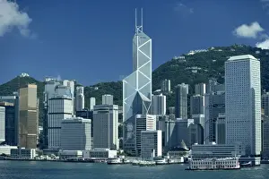 Bank Of China Prints: The city skyline from the harbour with the Bank of China in the centre on Hong Kong Island