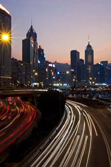 Tail Lights Prints: City skyline with IFC Tower at dusk, Hong Kong, China, Asia