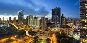 Panama Prints: City skyline illuminated at dusk, Panama City, Panama, Central America