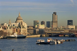 City skyline, including St. Pauls Cathedral, the NatWest Tower and Southwark Bridge