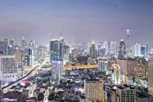 City skyline looking along the BTS Skytrain, Sukhumvit Road and Phloen Chit, with