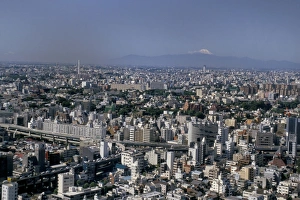 Mount Fuji Prints: City skyline with Mount Fuji beyond