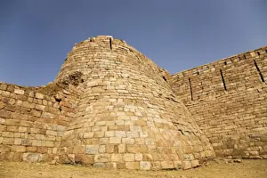 Travel Destinatio Prints: The city walls of the ruined Tughluqabad Fortress are up to 15 metres high
