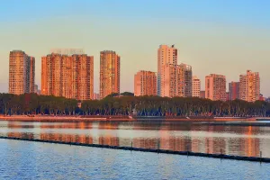 Silhouettes Prints: Cityscape of Jiujiang City at sunset over the Sai Lake, Jiangxi Province, China