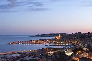 Images Dated 4th April 2010: A cityscape of Menton at dusk, Provence-Alpes-Cote d Azur, French Riviera, France, Mediterranean