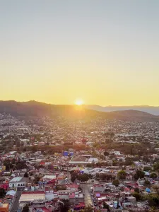 Glow Prints: Cityscape seen from Cerro del Fortin at sunset, Oaxaca de Juarez, Oaxaca State, Mexico