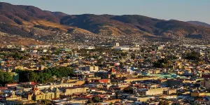 Oaxaca Prints: Cityscape seen from Cerro del Fortin at sunset, Oaxaca de Juarez, Oaxaca State, Mexico
