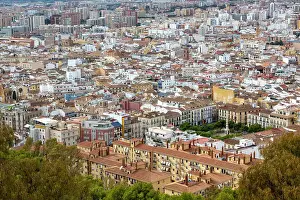 Cityscape view of high density buildings in city centre with Plaza de Merced in lower right, Malaga, Andalusia, Spain, Europe