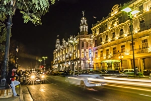 Old Havana Prints: Cityscape view of the Hotel Inglaterra taken at night, taken from the Prado in old Havana