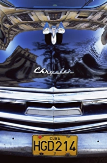 Chrome Prints: Detail of classic black Chrysler car with reflections in paintwork, Havana
