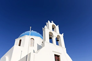 Greek Orthodox Prints: Classic Greek Orthodox church with blue dome, Oia, Santorini, Cyclades, Greek Islands