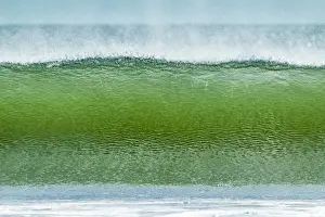 Classic tubular shore break surfing wave typical of this region, Playa Hermosa, San Juan del Sur, Rivas Province, Nicaragua, Central America