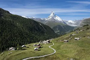 Typically Swiss Prints: The classic Walkers Haute route from Chamonix to Zermatt the trail leads down into