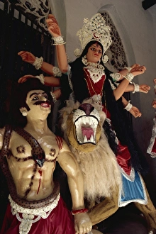 Clay based images including one of Durga, the ten armed warrior goddess