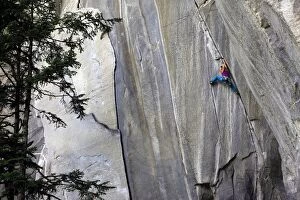 Lifestyle Gallery: A climber ascending a difficult crack climb, Cadarese Valley, northern Italy, Europe