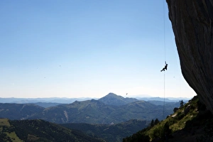 Rock Climber Prints: A climber ascends a rope on the cliffs of Ceuse, a mountain in the Alpes Maritimes