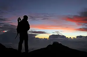 One Man Only Prints: A climber looks towards Mawenzi from near the summit of Mount Kilimanjaro at dawn